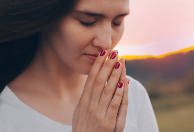 a woman praying